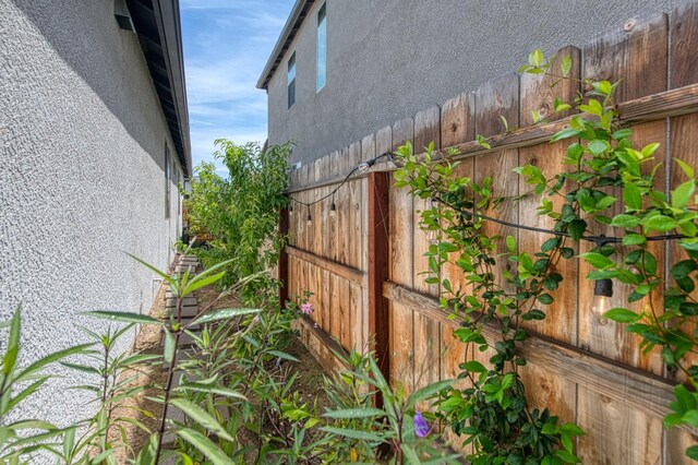 1363 E Via Prato Dr, Fresno, CA 93730 - exterior view of stucco siding