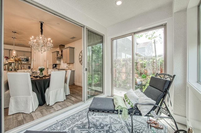 1363 E Via Prato Dr, Fresno, CA 93730 - sunroom / solarium with a chandelier