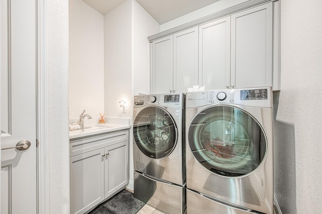 1363 E Via Prato Dr, Fresno, CA 93730 - laundry room with cabinet space and independent washer and dryer