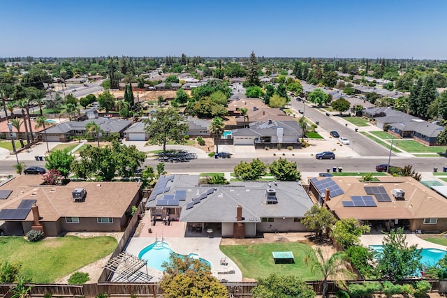 6052 N Spalding Ave, Fresno, CA 93710 - aerial perspective of suburban area with a pool area
