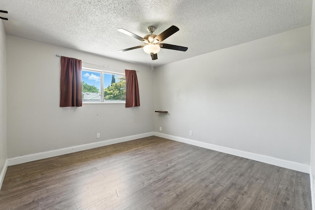6052 N Spalding Ave, Fresno, CA 93710 - unfurnished room with a ceiling fan, a textured ceiling, and dark wood finished floors