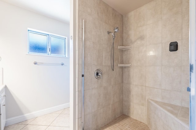 6052 N Spalding Ave, Fresno, CA 93710 - full bathroom with a shower stall, vanity, and tile patterned flooring