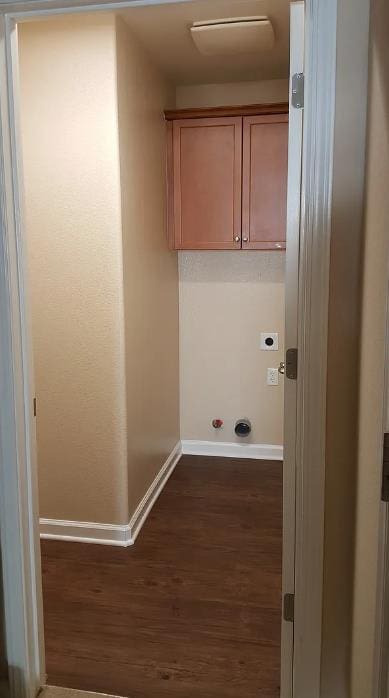 1982 N Todd Hedrick, Clovis, CA 93619 - laundry area featuring dark wood-style flooring, cabinet space, and hookup for an electric dryer