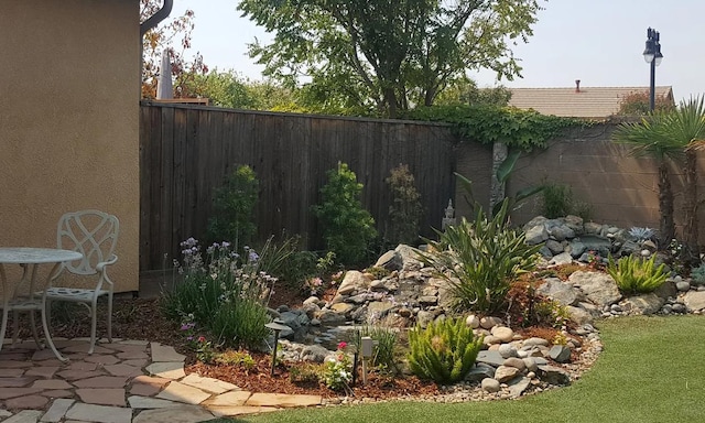 1982 N Todd Hedrick, Clovis, CA 93619 - fenced backyard with a patio area