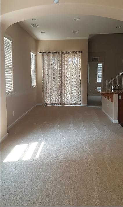 1982 N Todd Hedrick, Clovis, CA 93619 - carpeted spare room with baseboards and stairs