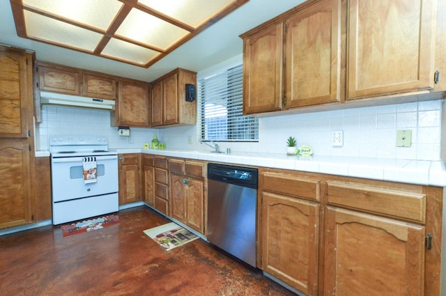 1325 Griffith Ave, Clovis, CA 93612 - kitchen featuring stainless steel dishwasher, white electric range oven, under cabinet range hood, finished concrete flooring, and decorative backsplash