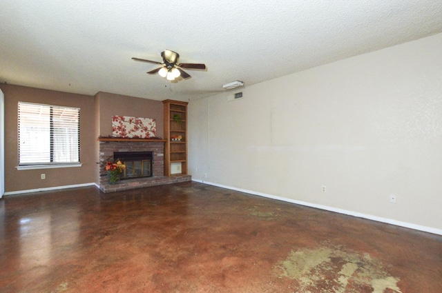1325 Griffith Ave, Clovis, CA 93612 - unfurnished living room with concrete floors, a ceiling fan, a brick fireplace, and a textured ceiling
