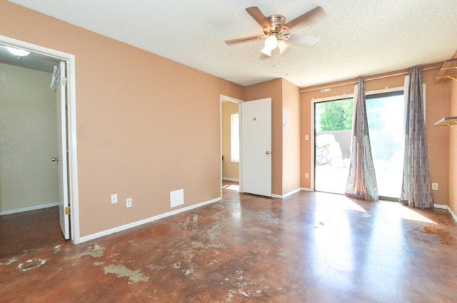 1325 Griffith Ave, Clovis, CA 93612 - empty room featuring finished concrete floors, ceiling fan, and a textured ceiling