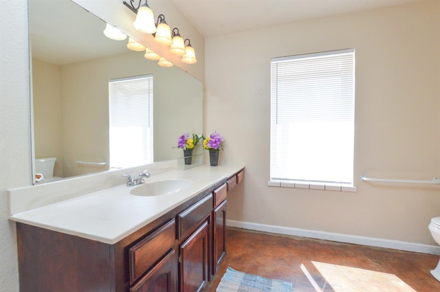 1325 Griffith Ave, Clovis, CA 93612 - bathroom with vanity and concrete flooring
