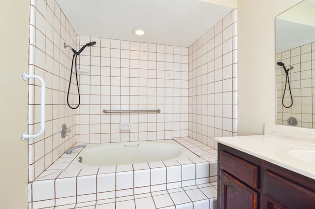 1325 Griffith Ave, Clovis, CA 93612 - full bathroom featuring vanity, tiled shower / bath combo, and recessed lighting