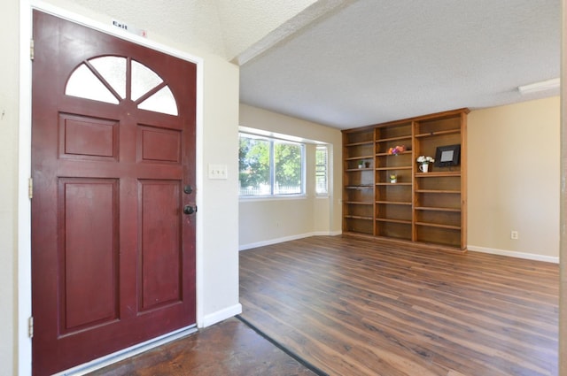 1325 Griffith Ave, Clovis, CA 93612 - foyer entrance featuring a textured ceiling and dark wood-style floors