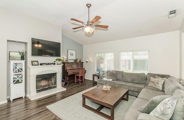 5783 N State St, Fresno, CA 93722 - living room with vaulted ceiling, wood finished floors, a ceiling fan, and a glass covered fireplace