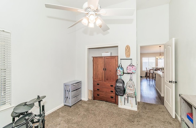 5783 N State St, Fresno, CA 93722 - carpeted bedroom with baseboards and ceiling fan