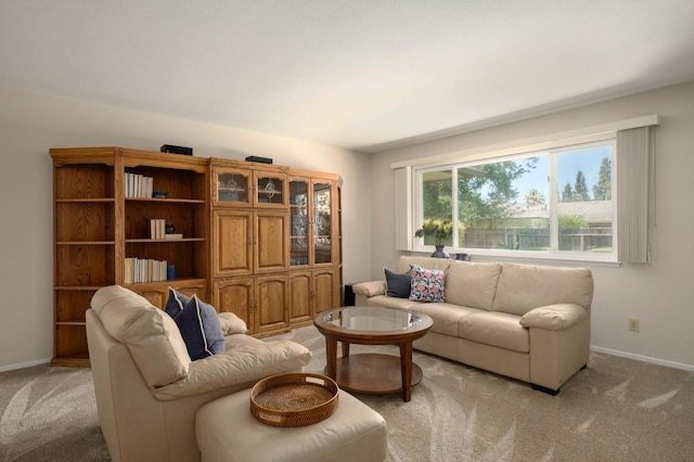 3218 E Ellery Ave, Fresno, CA 93710 - living area featuring light carpet and baseboards