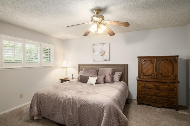 3218 E Ellery Ave, Fresno, CA 93710 - bedroom with carpet, a textured ceiling, and a ceiling fan