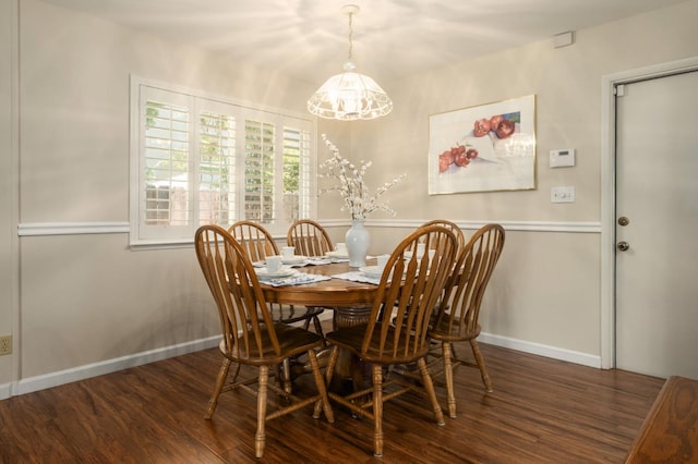 3218 E Ellery Ave, Fresno, CA 93710 - dining space featuring wood finished floors and a chandelier