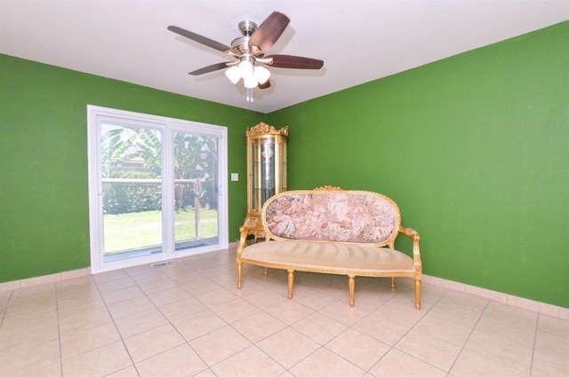 4879 E San Gabriel Ave, Fresno, CA 93726 - living area featuring a ceiling fan and light tile patterned flooring