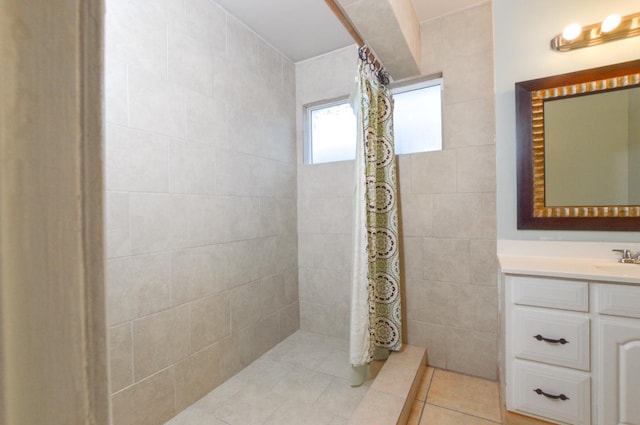 4879 E San Gabriel Ave, Fresno, CA 93726 - full bathroom featuring vanity, tiled shower, and tile patterned floors