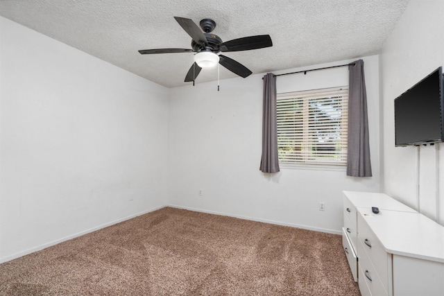 9938 N Canyon Creek Ln, Fresno, CA 93730 - unfurnished bedroom featuring carpet, a textured ceiling, and ceiling fan