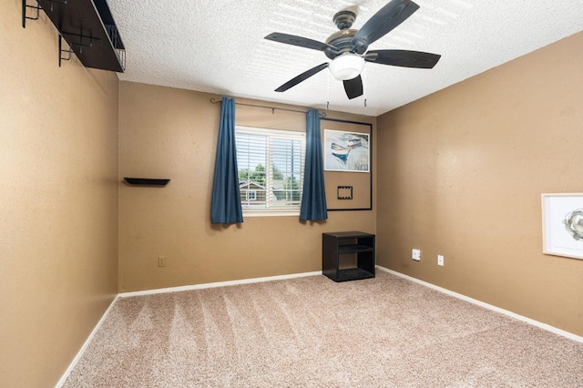 9938 N Canyon Creek Ln, Fresno, CA 93730 - carpeted empty room featuring ceiling fan and a textured ceiling