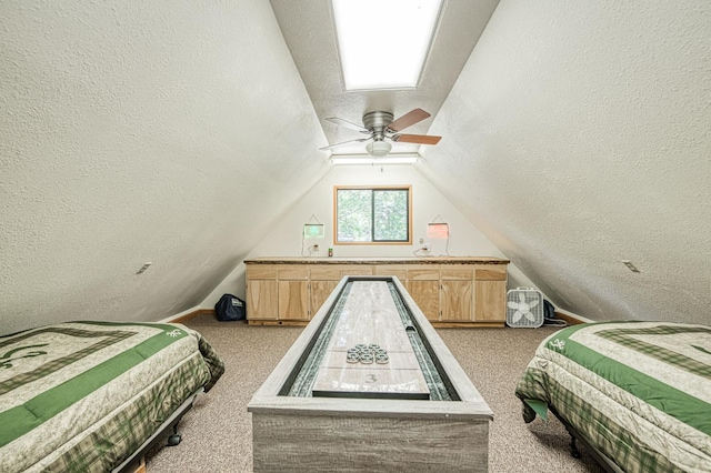 41798 Saddleback Rd, Shaver Lake, CA 93664 - carpeted bedroom featuring lofted ceiling, a textured ceiling, and a ceiling fan