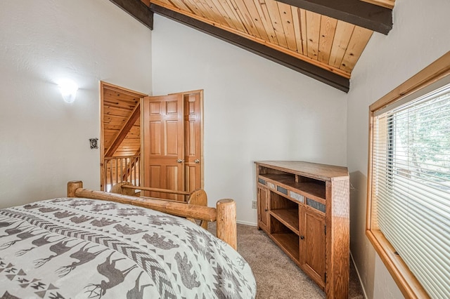 41798 Saddleback Rd, Shaver Lake, CA 93664 - bedroom with light carpet, a wood ceiling with exposed beams, and high vaulted ceiling