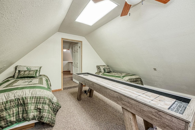 41798 Saddleback Rd, Shaver Lake, CA 93664 - carpeted bedroom featuring vaulted ceiling, a ceiling fan, and a textured ceiling