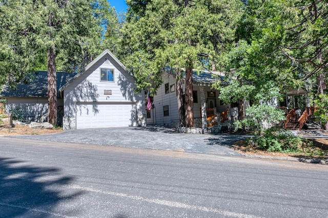 41798 Saddleback Rd, Shaver Lake, CA 93664 - obstructed view of property with asphalt driveway, stairs, and a garage