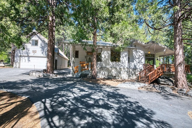 41798 Saddleback Rd, Shaver Lake, CA 93664 - view of front of home with an outbuilding, driveway, crawl space, and an attached garage
