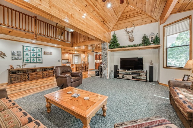 41798 Saddleback Rd, Shaver Lake, CA 93664 - carpeted living room with wood ceiling, high vaulted ceiling, and recessed lighting