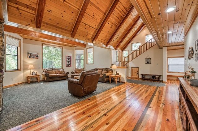 41798 Saddleback Rd, Shaver Lake, CA 93664 - carpeted living area with a wood ceiling with exposed beams, stairs, hardwood / wood-style flooring, and high vaulted ceiling