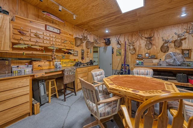 41798 Saddleback Rd, Shaver Lake, CA 93664 - dining room with a workshop area, wooden ceiling, and wooden walls
