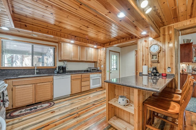 41798 Saddleback Rd, Shaver Lake, CA 93664 - kitchen featuring white appliances, wood ceiling, a breakfast bar area, a peninsula, and light wood-style floors