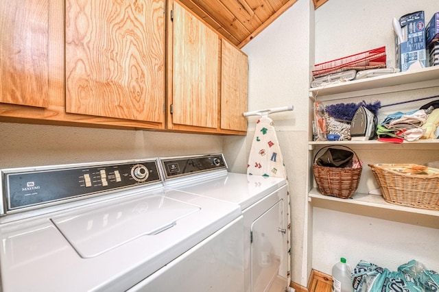 41798 Saddleback Rd, Shaver Lake, CA 93664 - laundry area featuring independent washer and dryer, cabinet space, and a textured wall