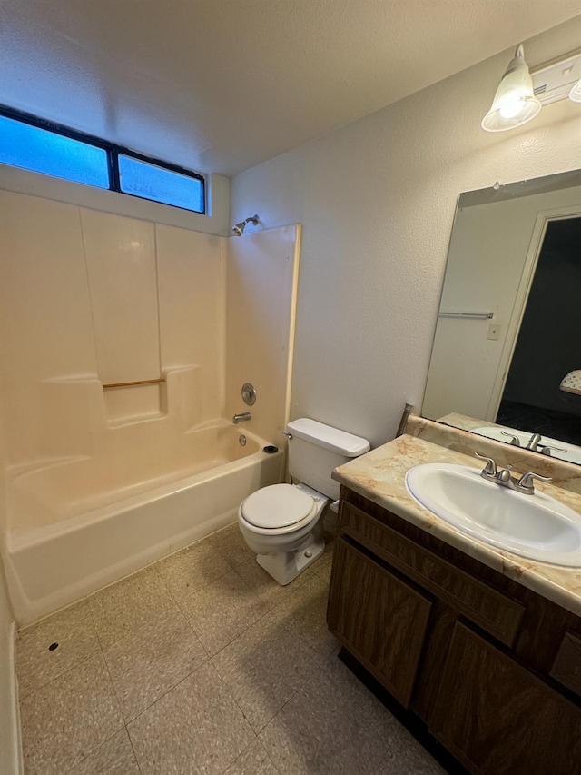 4303 N Emerson Ave, Fresno, CA 93705 - bathroom featuring bathtub / shower combination, vanity, and tile patterned floors