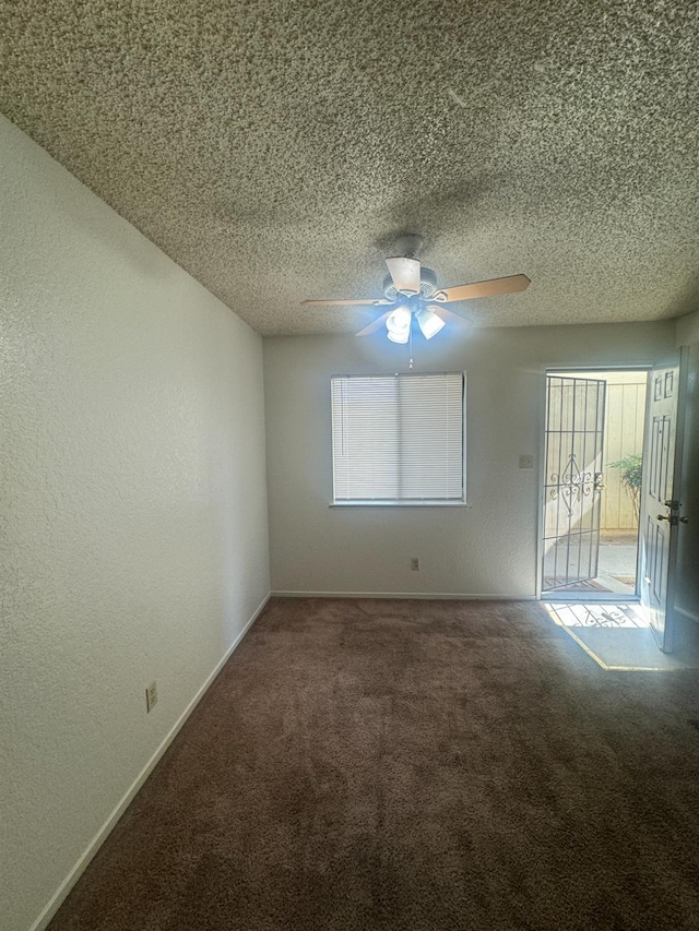 4303 N Emerson Ave, Fresno, CA 93705 - carpeted empty room featuring ceiling fan, a textured wall, and a textured ceiling