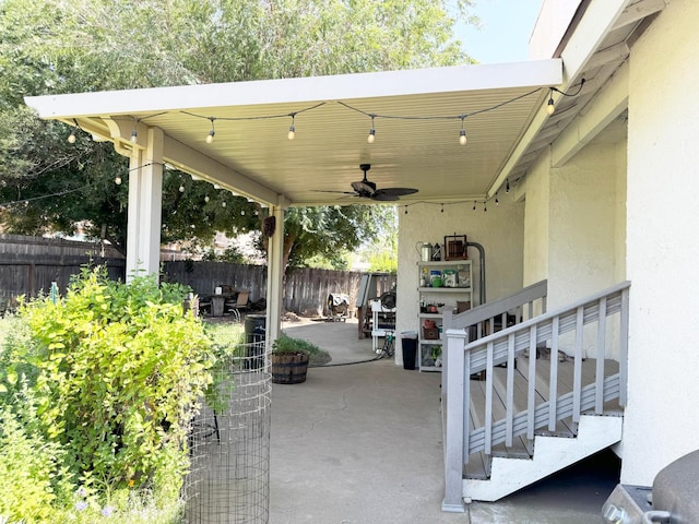 650 N Burgan Ave, Fresno, CA 93727 - fenced backyard with ceiling fan and a patio area