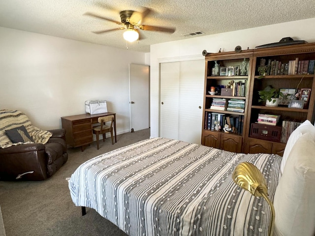 650 N Burgan Ave, Fresno, CA 93727 - bedroom with carpet flooring, a textured ceiling, and ceiling fan