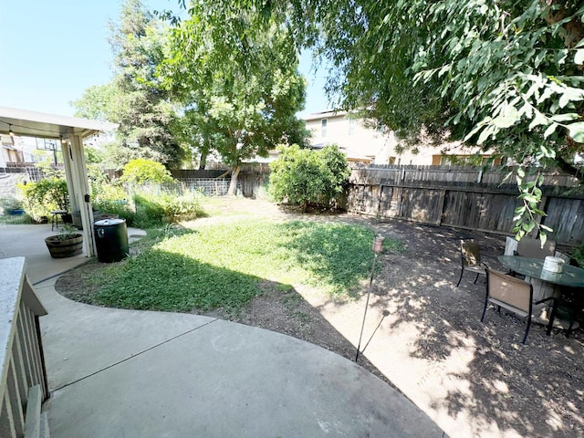 650 N Burgan Ave, Fresno, CA 93727 - fenced backyard featuring a patio