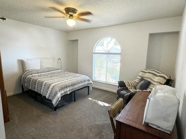 650 N Burgan Ave, Fresno, CA 93727 - carpeted bedroom featuring a textured ceiling and a ceiling fan