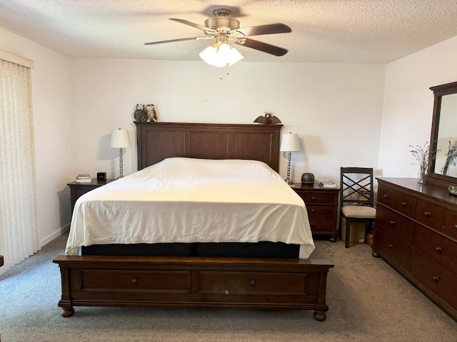 650 N Burgan Ave, Fresno, CA 93727 - bedroom featuring light carpet, ceiling fan, and a textured ceiling