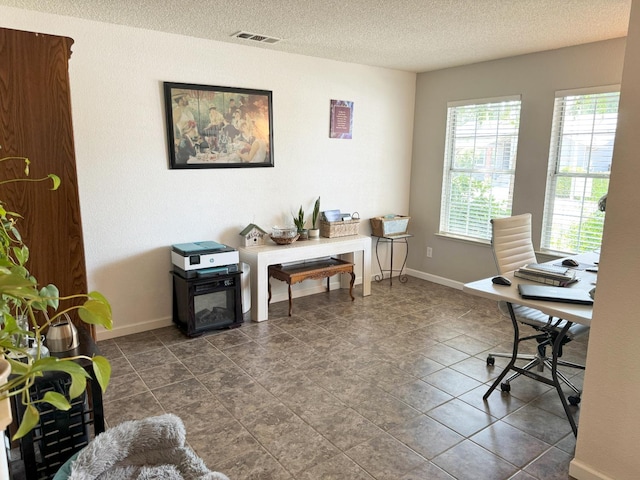 650 N Burgan Ave, Fresno, CA 93727 - office with a textured ceiling and baseboards