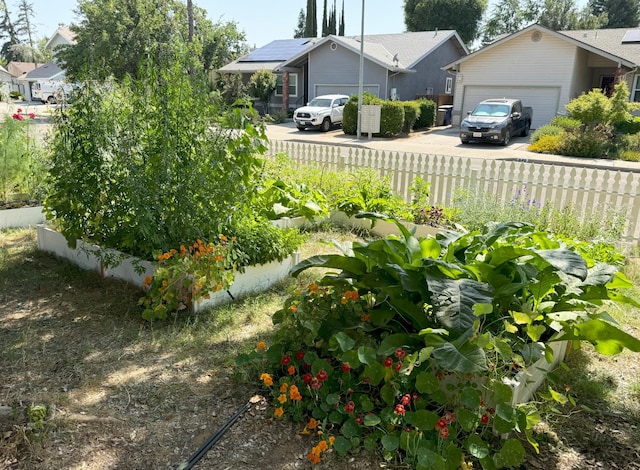 650 N Burgan Ave, Fresno, CA 93727 - view of yard featuring a garage and driveway