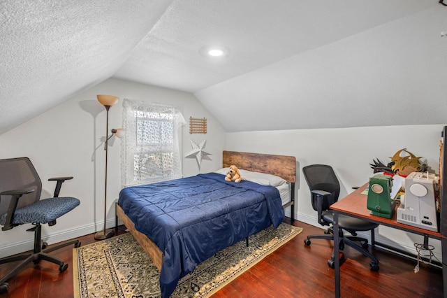 3144 Vista Ave, San Diego, CA 91945 - bedroom featuring wood finished floors, vaulted ceiling, and a textured ceiling