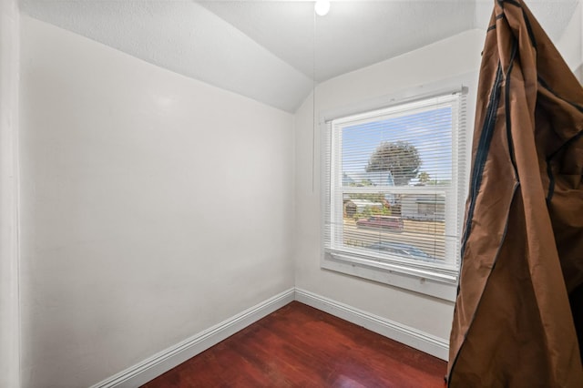 3144 Vista Ave, San Diego, CA 91945 - unfurnished room with dark wood-style flooring and vaulted ceiling