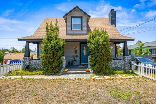 3144 Vista Ave, San Diego, CA 91945 - view of front of home with a porch, a chimney, and roof with shingles