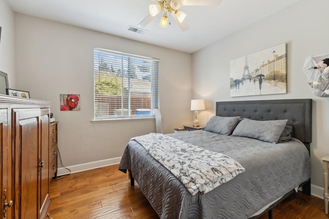 7310 N Katy Ave, Fresno, CA 93722 - bedroom with wood finished floors and a ceiling fan