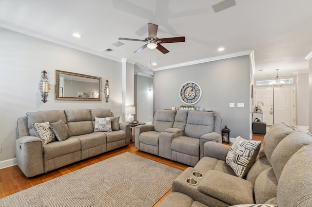 7310 N Katy Ave, Fresno, CA 93722 - living area with ceiling fan, crown molding, wood finished floors, recessed lighting, and a chandelier