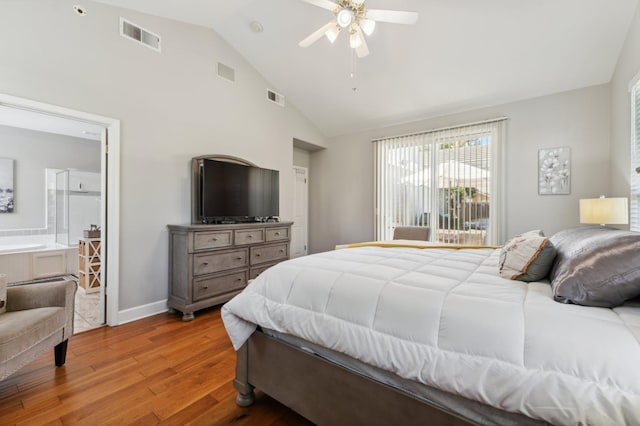 7310 N Katy Ave, Fresno, CA 93722 - bedroom with wood finished floors, high vaulted ceiling, ensuite bath, ceiling fan, and access to outside