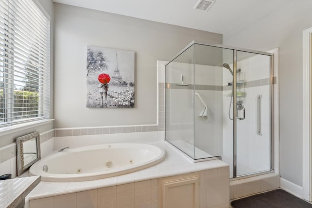 7310 N Katy Ave, Fresno, CA 93722 - full bathroom with a shower stall and a whirlpool tub
